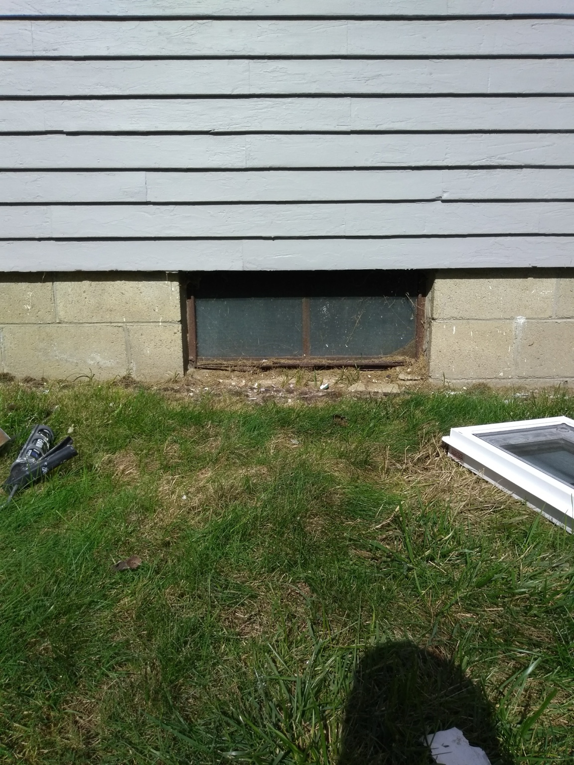 Original basement window before replacement